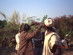 cd1709-83-f504-22.jpg Closing rites, the two officiants treat each other