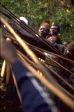 _cd1709-10-f217-20.jpg 3. Blowing beer over the spears held by the classifcatory sons of the man whose grave is being treated. The man organising the rite is visible wearing the brown hat